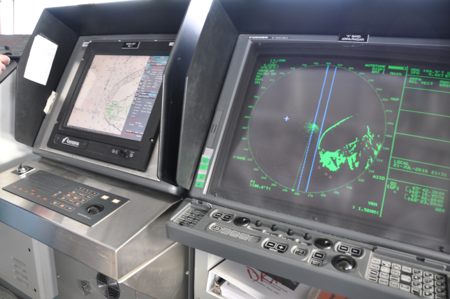 Radar image of Cape Prince of Wales mirrors image of electronic nautical charton bridge of NOAA Ship FAIRWEATHER