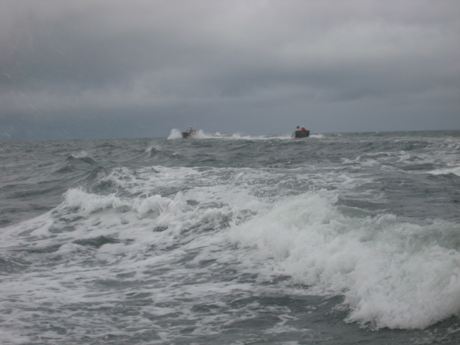 Three ship's boats going to work in the vicinity of Kotzebue