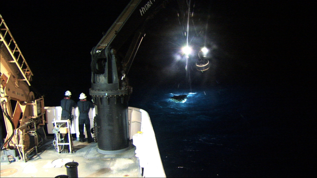Either deploying or recovering Deep Discoverer during night operations on theNOAA Ship OKEANOS EXPLORER