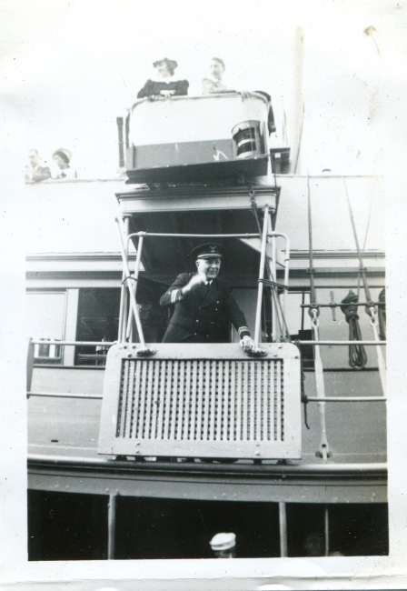 Captain Ray Schoppe on the bridge wing of the SURVEYOR duringdocking operations