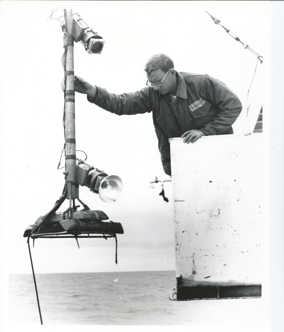 Survey technician Elmer Larsen deploying a seafloor camera