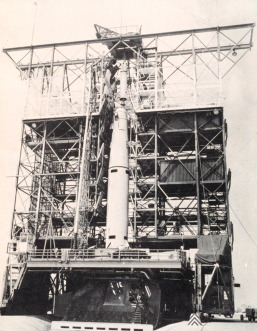 Second stage of Thor-Able rocket being set in place prior to launching TIROS I