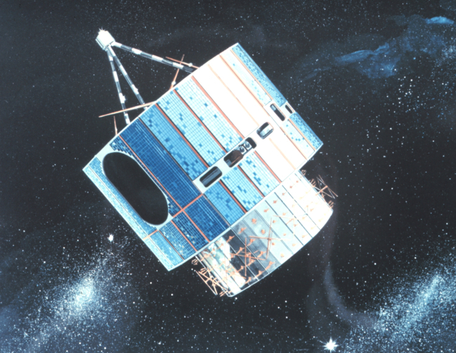 Graphic of early GOES satellite in orbit