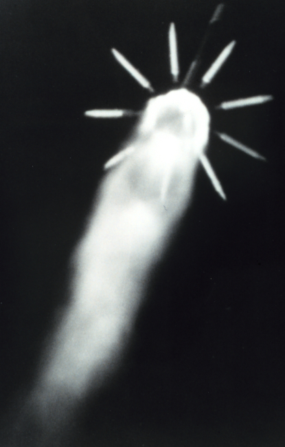 The nine solid rocket motors used to augment the thrust of Delta 116 are beingjettisoned 87 seconds after the launch at approximately 18 miles altitude