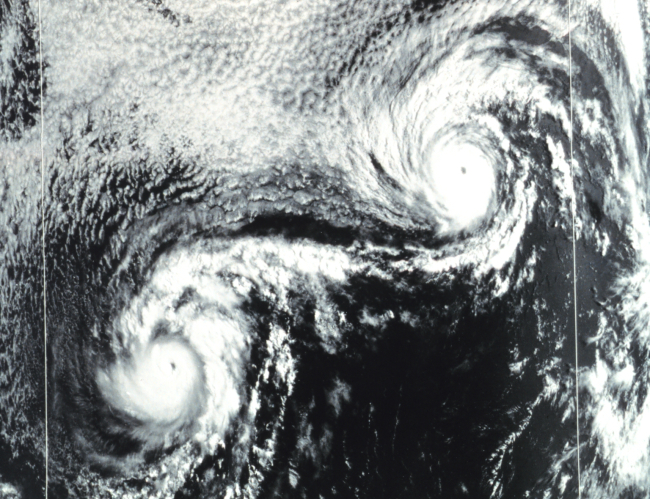 NOAA-3 visible range VHRR image of Hurricanes Ione (left) and Kirsten (right