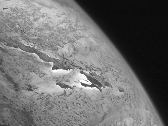Cuba, Hispaniola, and Jamaica illuminated by sunlight as seen at the far eastern extent of GOES-West's visible coverage