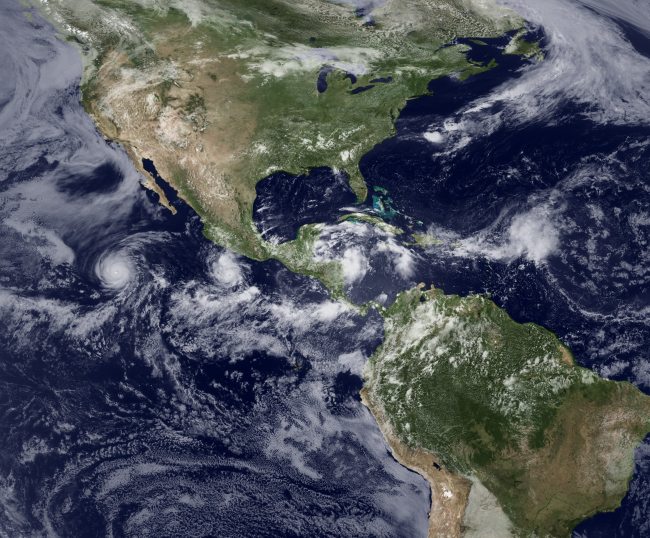 A very active Intertropical Convergence Zone showing from west to east Hurricane Celia heading west in the Pacific, major Hurricane Darby south of Mexicoalong the same latitude as Celia, a strengthening tropical disturbance in theCaribbean Sea, and a tropical wave just east of the northern Leeward Islands