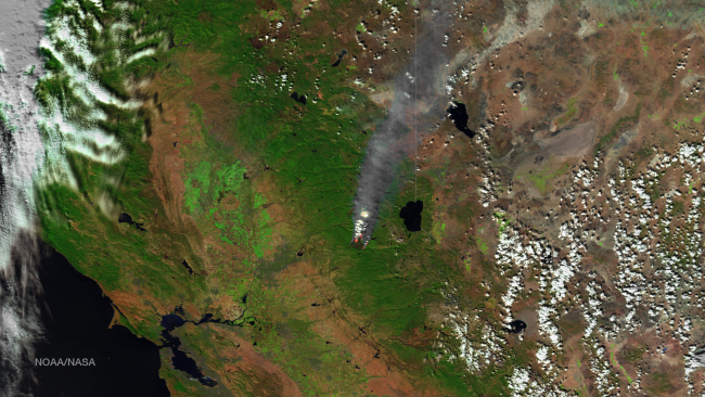 High resolution image of King Fire burning in the canyon of the South Fork ofthe American River north of the community of Pollock Pines