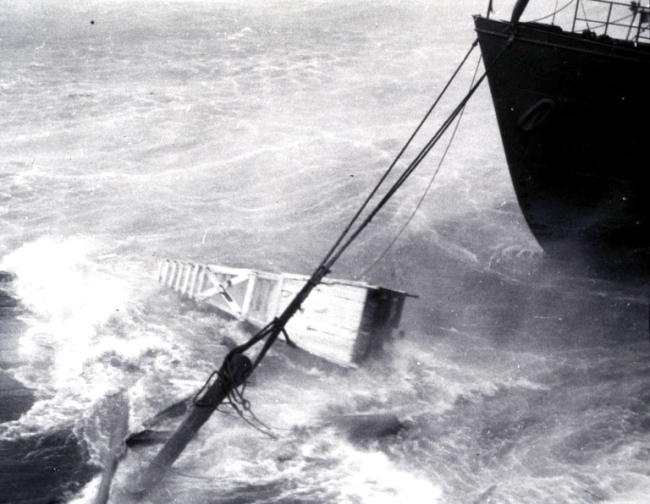 Bow of ALBATROSS III pulling out bollard during hurricane