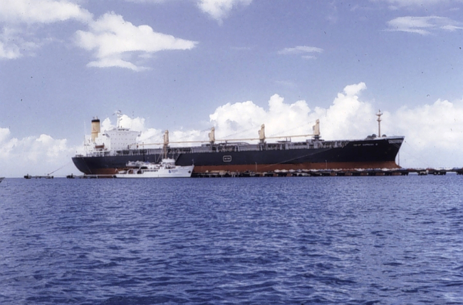 NOAA Ship PEIRCE next to large bulk carrier