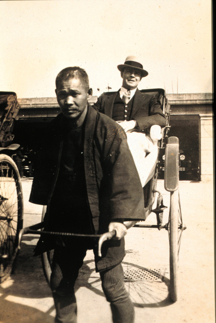 Robert Earle in a rickshaw at a stop at Shanghai while in transit tothe Philippines