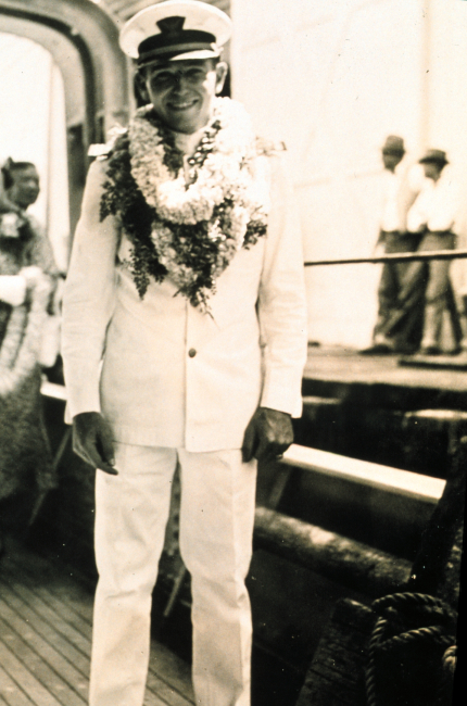Ensign John Ellerbee wearing lei at Honolulu