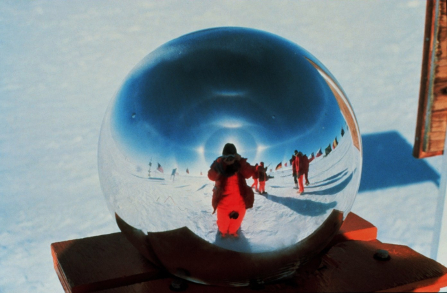 Photographer takes self-portrait in South Pole marker