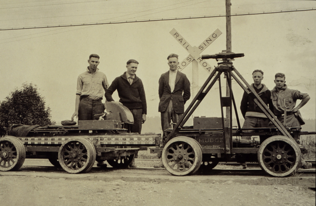 Crew with motor velocipedes and inclined level