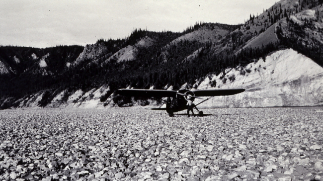 Gravel bar used as landing field at Rampart House