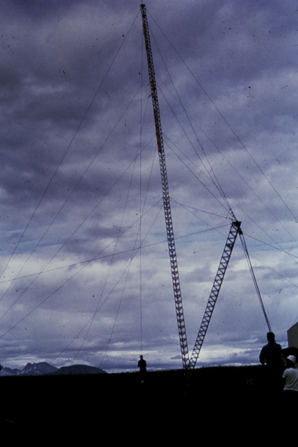 Erecting a 100-foot Raydist tower with a 30-foot gin pole