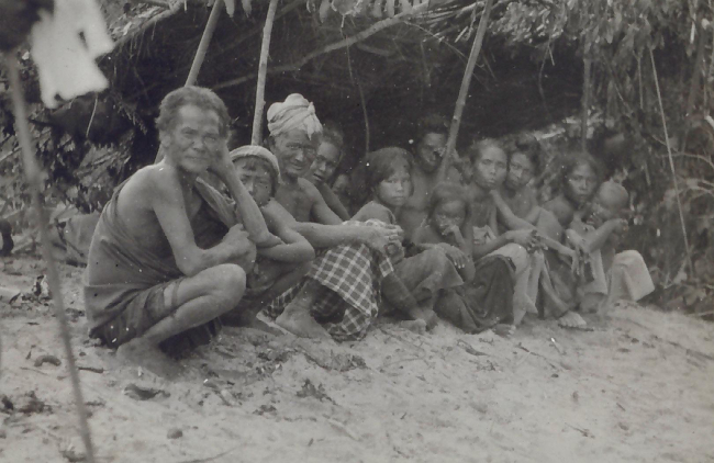Bilan tribesmen near C&GS; shore camp