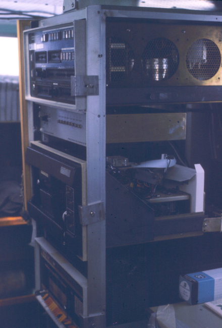 Hydroplot data acquisition system with controller on top paper tape reader anddata punch middle lower unit, and PDP-8 computer with orange and yellowswitches on bottom