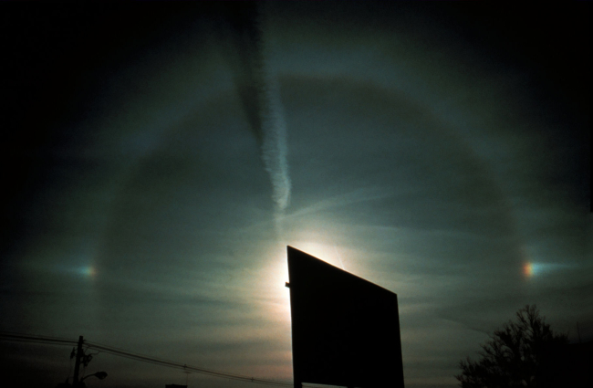 Partial halo with parhelia (sun dogs) on both sides of halo