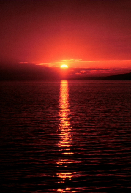 Bronze sunset reflecting in the Straits of Georgia