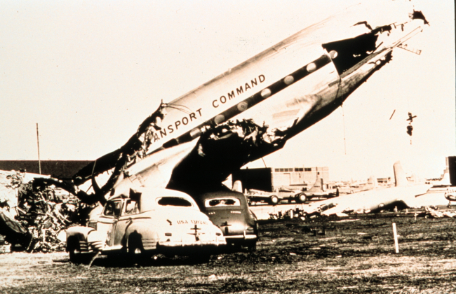 Remains of a large military aircraft after passage of tornadoTornado of March 25, 1948 at Tinker Air Force Base, OklahomaThe coming of this storm resulted in the first broadcast tornado warning