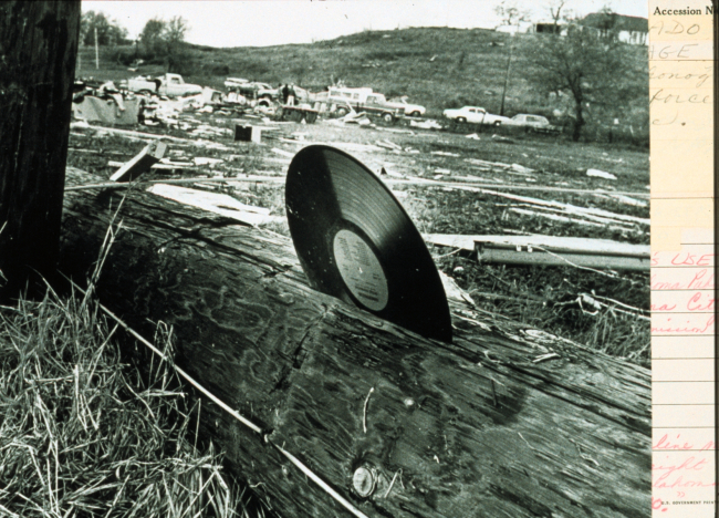The awesome power of a tornado demonstratedA 33rpm plastic record blown into a telephone pole
