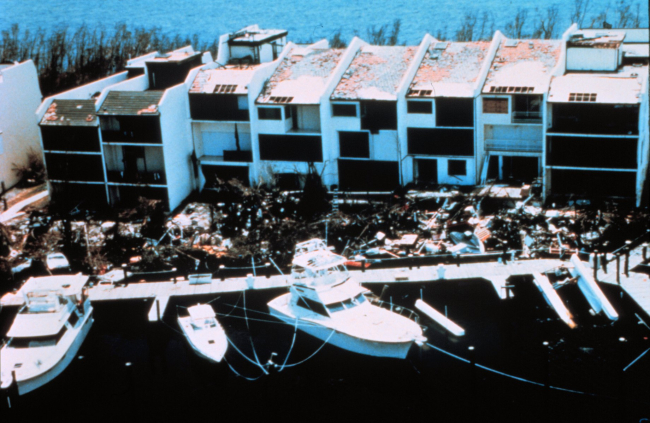 Hurricane Andrew - Kings Bay townhomes @ $750K eachDouble whammy from Andrew - upper windows blown out by winds before eyeDebris in foreground result of storm surge moving through lower levels