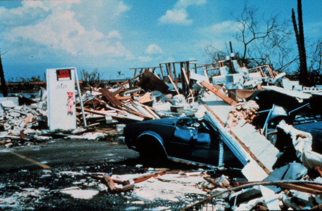 Hurricane Andrew - Concrete tie beam deposited on a car
