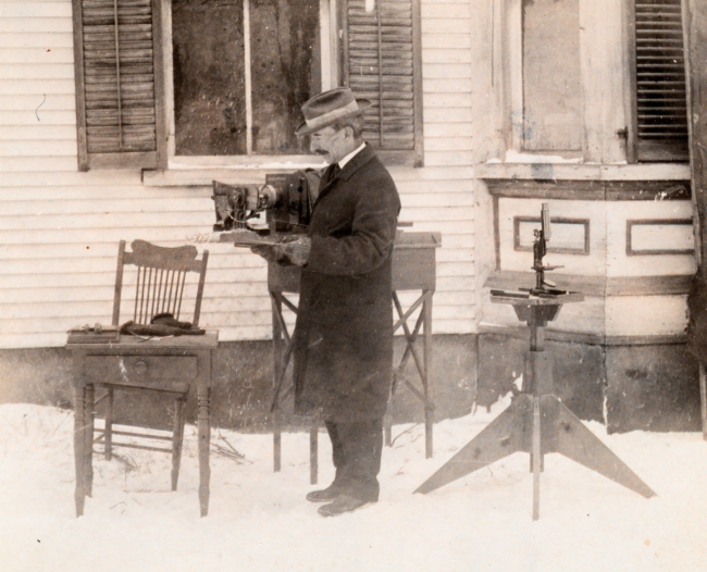 Wilson Bentley, the snowflake man, shown with his camera apparatus forphotographing snowflakes