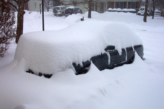 Automobile being covered by snow - Photo #2