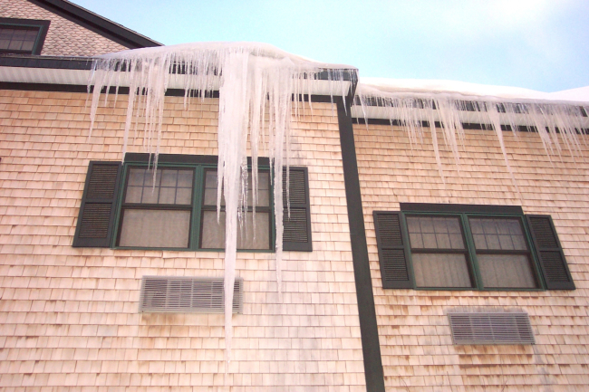 A king-sized icicle hanging from a motel roof