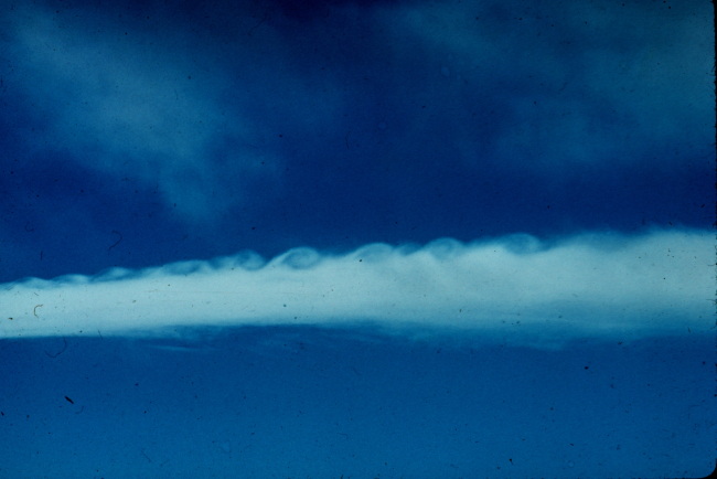 Clouds showing appearance of breaking waves east of the continental divide