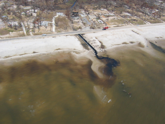 Destroyed homes and ecological damage along Waveland beachfront