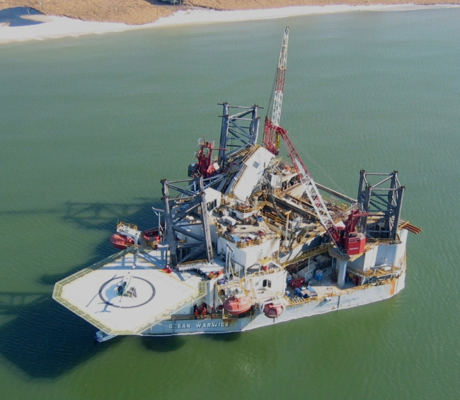 Oil rig washed aground