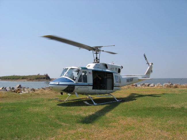 NOAA Helicopter 61 conducting post-Katrina inspections and studies