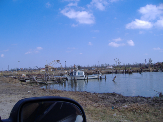 Tieing up to the remains of a pier destroyed by Hurricane Katrina