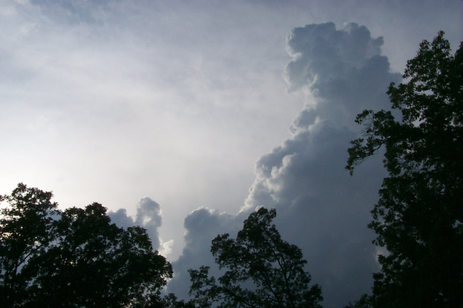 A towering cumulus builds over the Harpers Ferry area