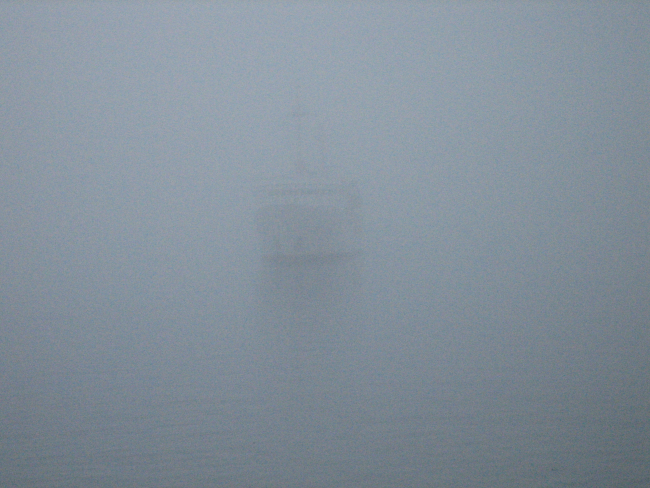Photo #2 of NOAA Ship FAIRWEATHER approaching pier in fog at Valdez