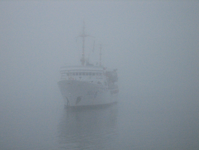 Photo #4 of NOAA Ship FAIRWEATHER approaching pier in fog at Valdez
