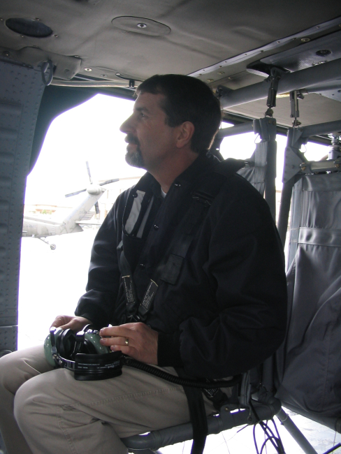 George Cline, meteorological technician, photo documenting flood damage froma helicopter along the San Joaquin River