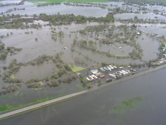 Flooding of farmlands and homes along the San Joaquin River