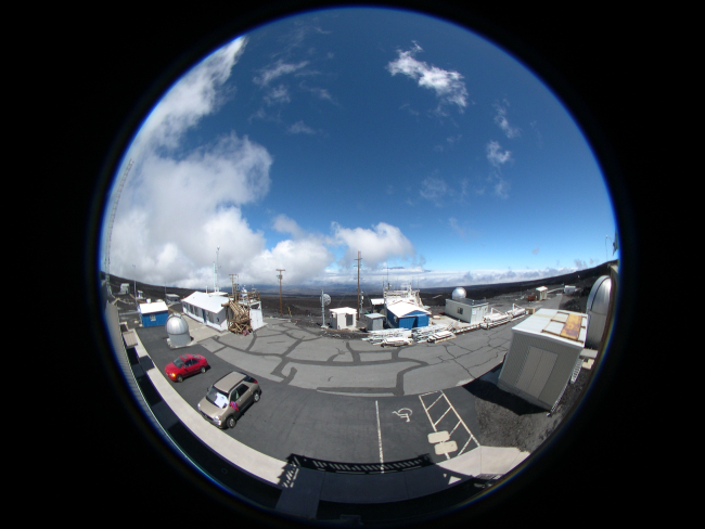 This fisheye image of the Mauna Loa Observatory in Hawaii was taken from theinstrument desk atop the NDSC building