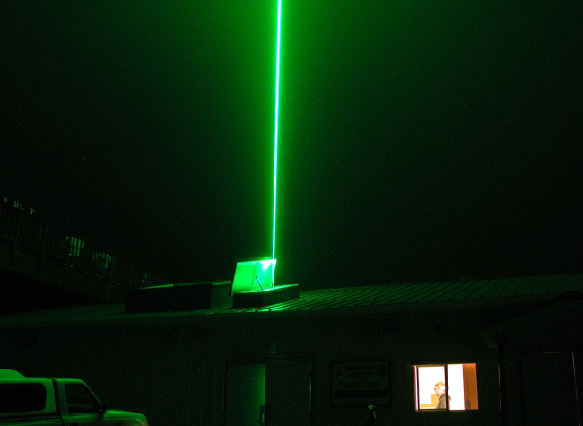 The brilliant green beam of the lidar at the Mauna Loa Observatory (MLO)pierces up to the stratosphere to measure aerosols and water vapor