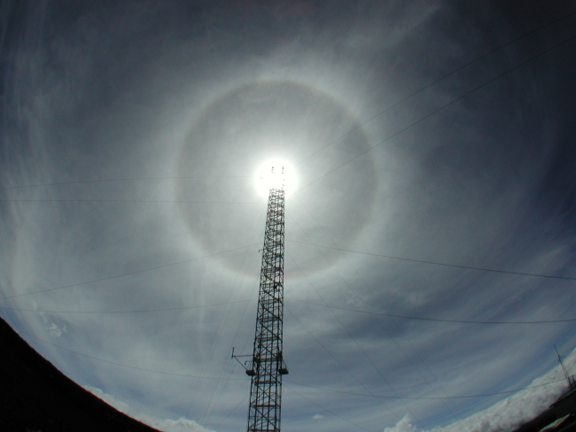 This full solar halo formed by the refraction of sunlight from ice crystalsin cirrus clouds