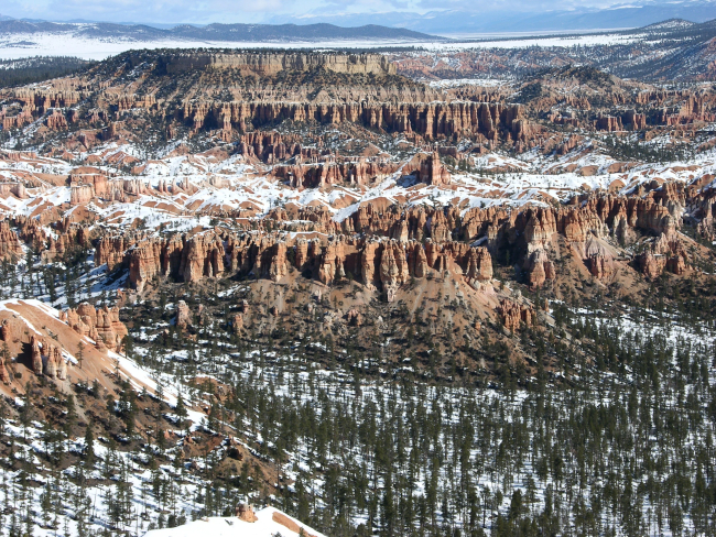 Snow and red rock formations at Bryce Canyon National Park