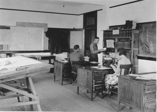 Signal Corps meteorological students working in the reference section