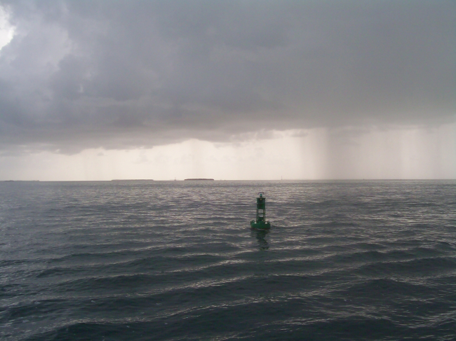 Rain squalls in the area as the NOAA Ship PISCES departs Key West