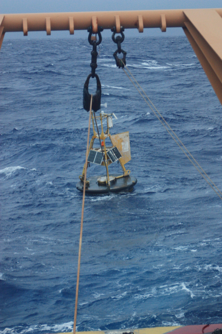 Recovering an adrift 3-meter weather buoy off the NOAA Ship Ka'imimoana