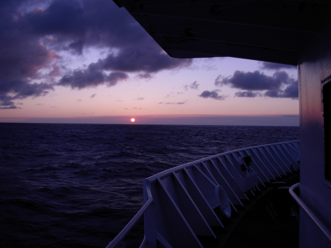 Tropical sunset at sea