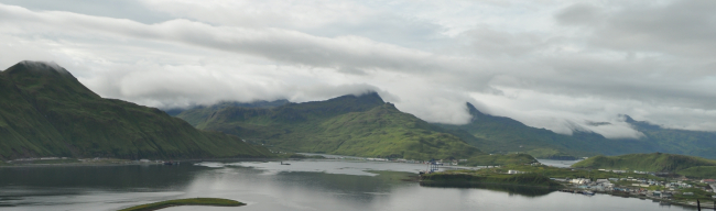 Clouds filling mountain valleys above Dutch Harbor